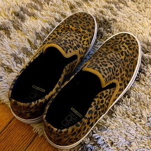 Slip on Cheetah print shoes. Worn twice